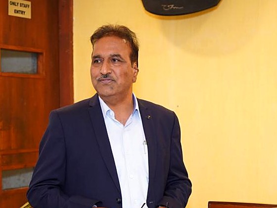 Vijay Sharma speaking at an event
